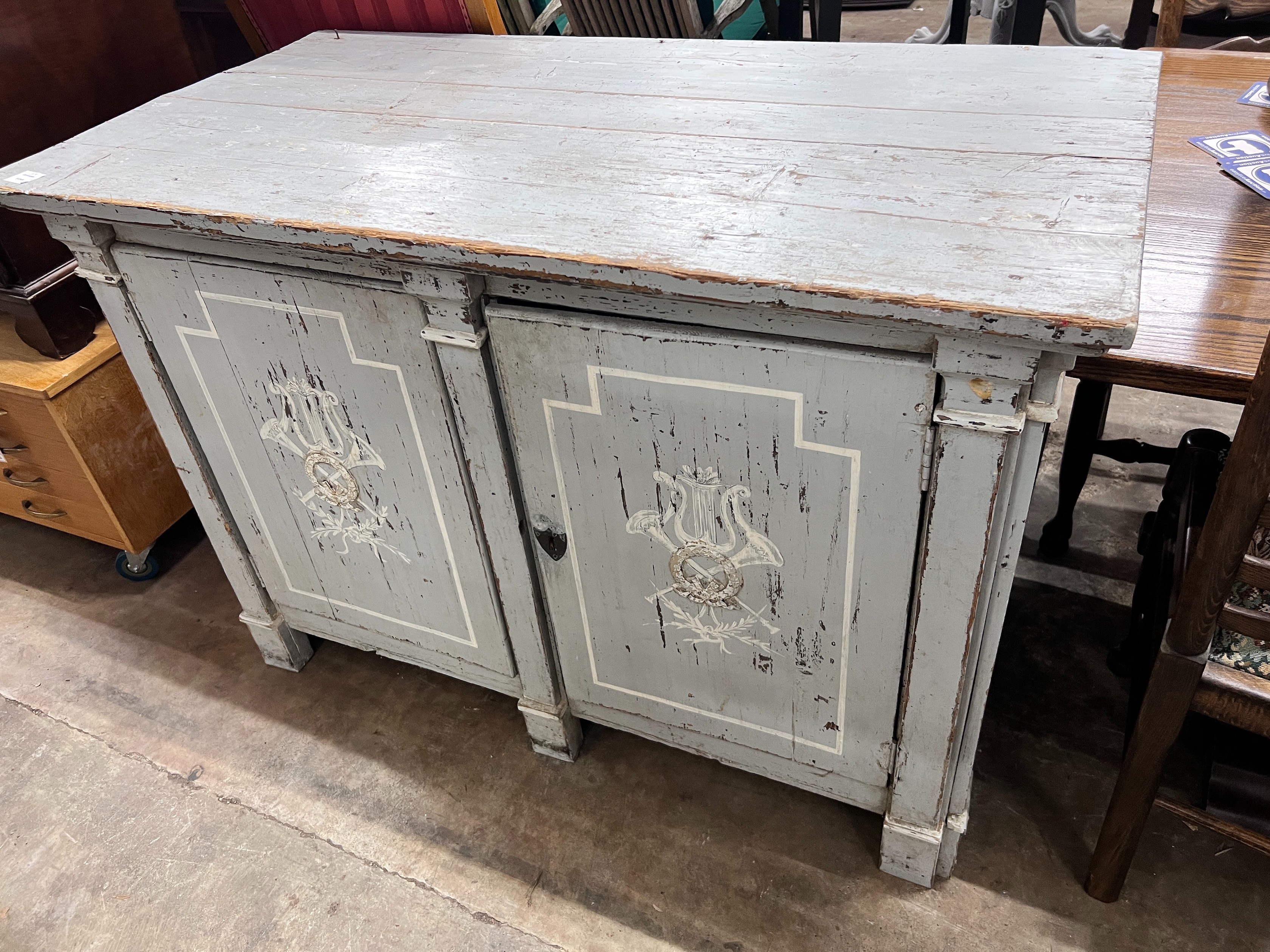 A continental painted pine low cupboard, width 125cm *Please note the sale commences at 9am.
